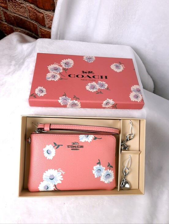Coach Handbags - Coach Pink Floral Wristlet Pouch with Charm
